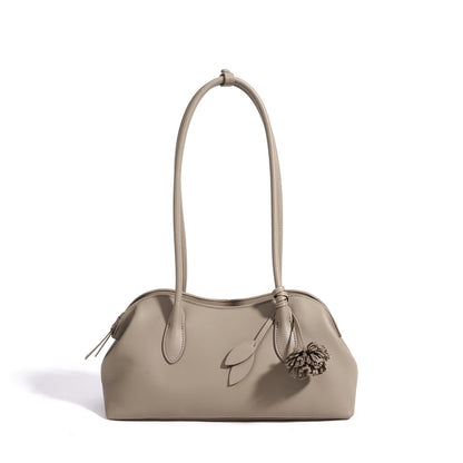 Minimalist Supple Genuine Leather Curved Clutch Bag with Playful Charm
