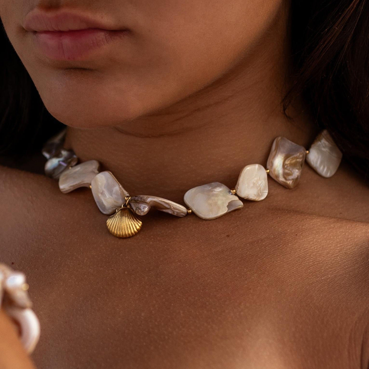 Collier pendentif en corde de coquillage de niche