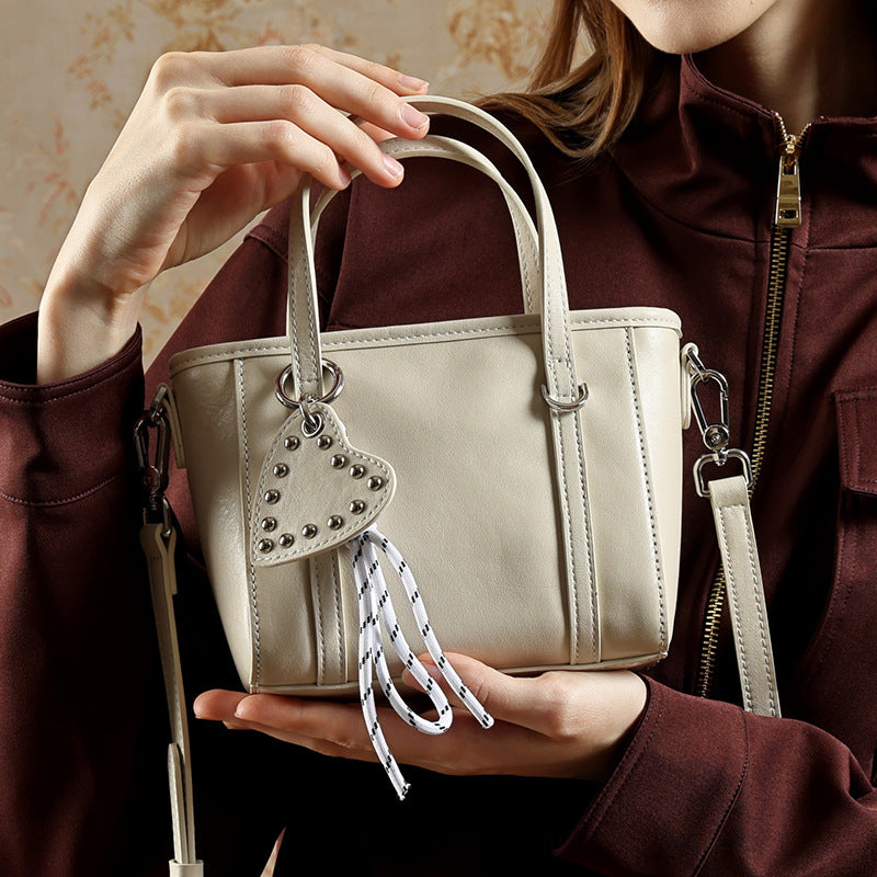 Sculpted Genuine Leather Mini Tote Crossbody Bag with Signature Heart Charm