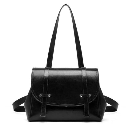 The Oil-Waxed Genuine Leather Convertible Flap Backpack Shoulder Bag
