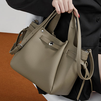 The Pebbled Genuine Leather Mini Bucket Tote Bag with Turn-Lock Closure