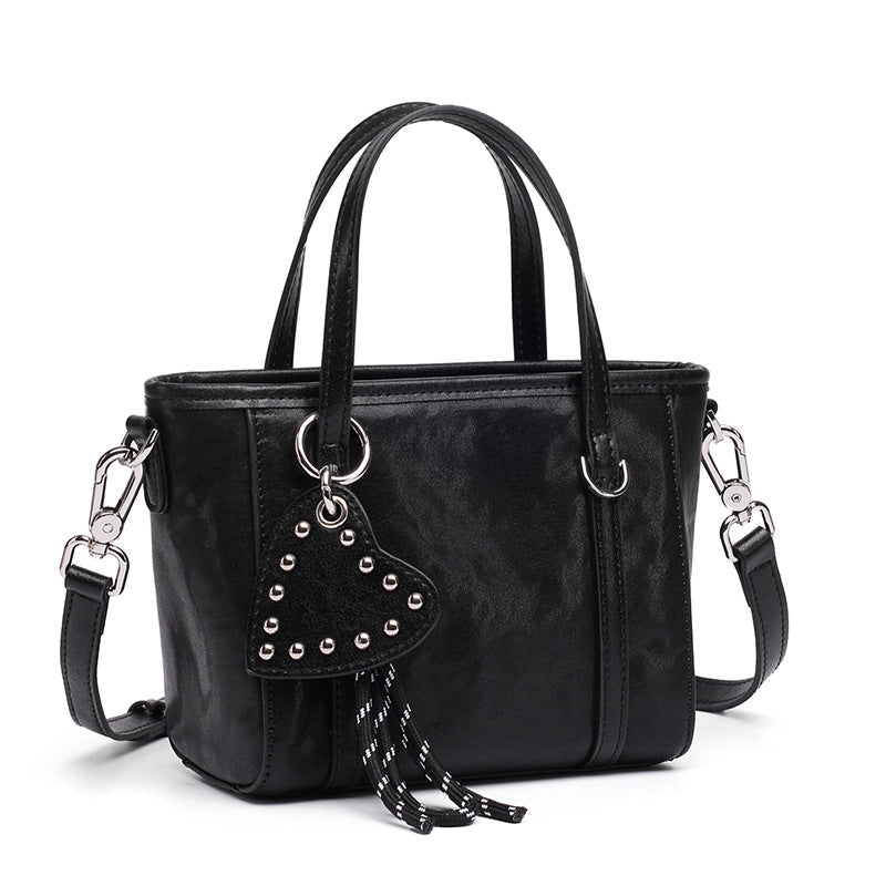 Sculpted Genuine Leather Mini Tote Crossbody Bag with Signature Heart Charm