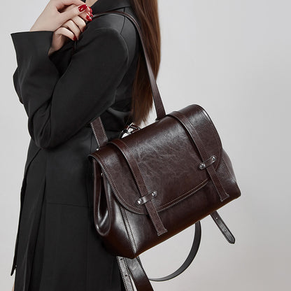 The Oil-Waxed Genuine Leather Convertible Flap Backpack Shoulder Bag
