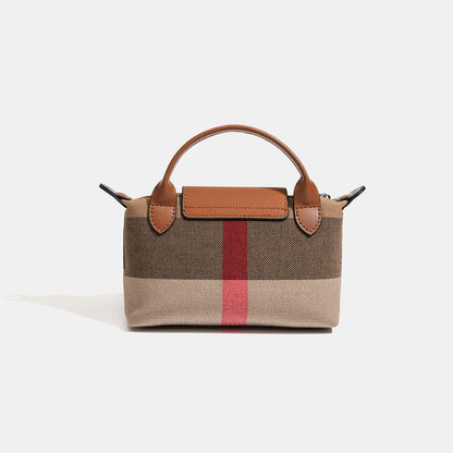 Bolso clutch bandolera de lona tejida con estampado clásico de cuadros británicos