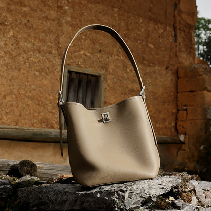 Sculpted Genuine Leather Medium Bucket Bag with Clean Linear Topstitching