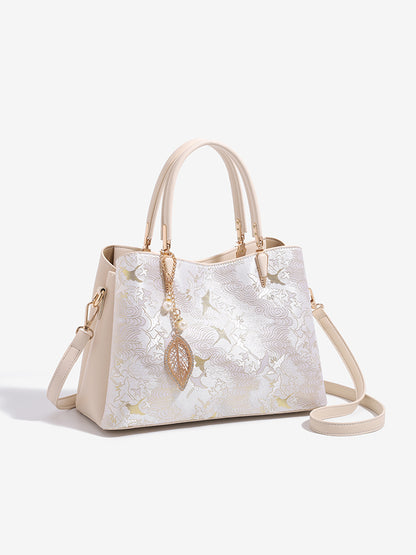 Sophisticated Oriental Jacquard Vegan Eco‑Leather Clutch Bag with Leaf Charm