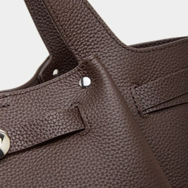 The Pebbled Genuine Leather Mini Bucket Tote Bag with Turn-Lock Closure