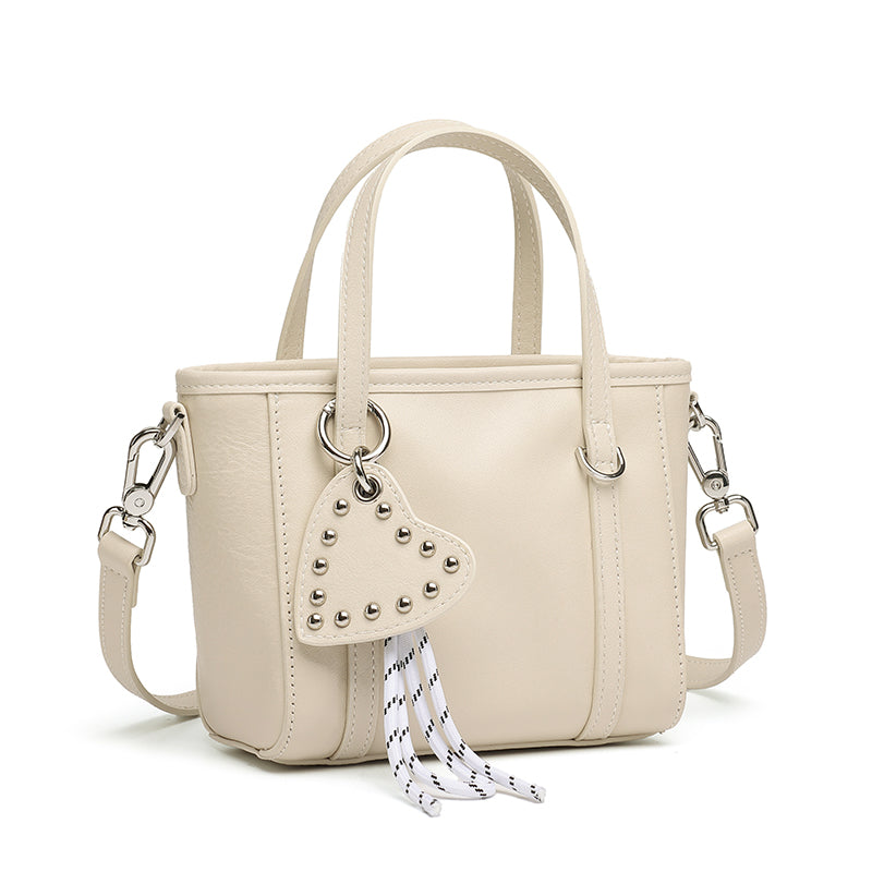 Mini tote a tracolla in vera pelle scolpita con distintivo cuore