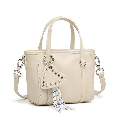 Mini tote a tracolla in vera pelle scolpita con distintivo cuore