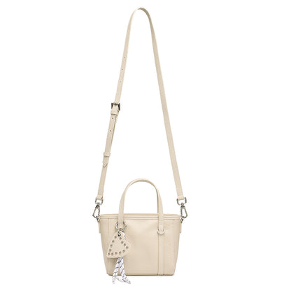 Mini tote a tracolla in vera pelle scolpita con distintivo cuore