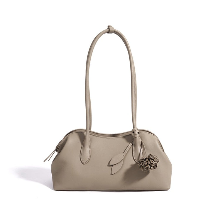Minimalist Supple Genuine Leather Curved Clutch Bag with Playful Charm
