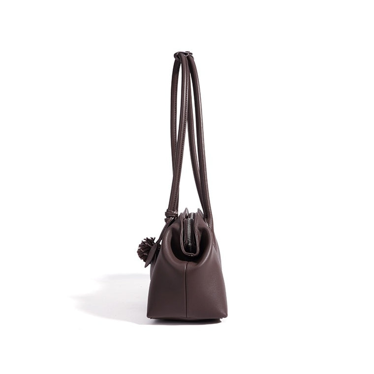 Minimalist Supple Genuine Leather Curved Clutch Bag with Playful Charm