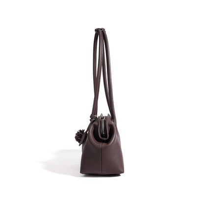 Minimalist Supple Genuine Leather Curved Clutch Bag with Playful Charm