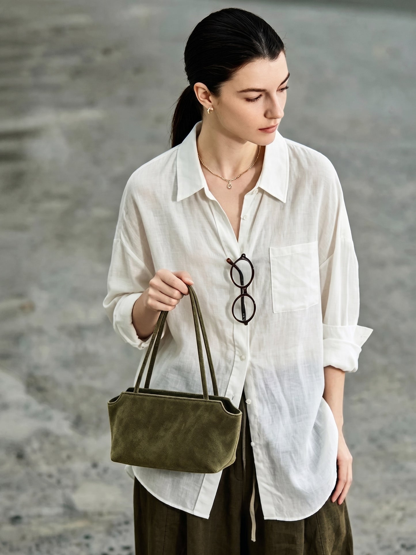 Pochette vintage en cuir suédé