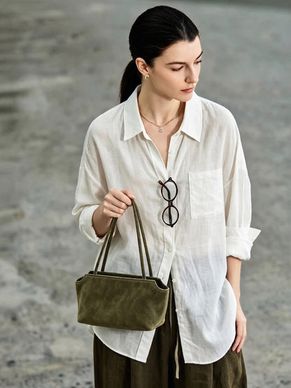 Pochette vintage en cuir suédé