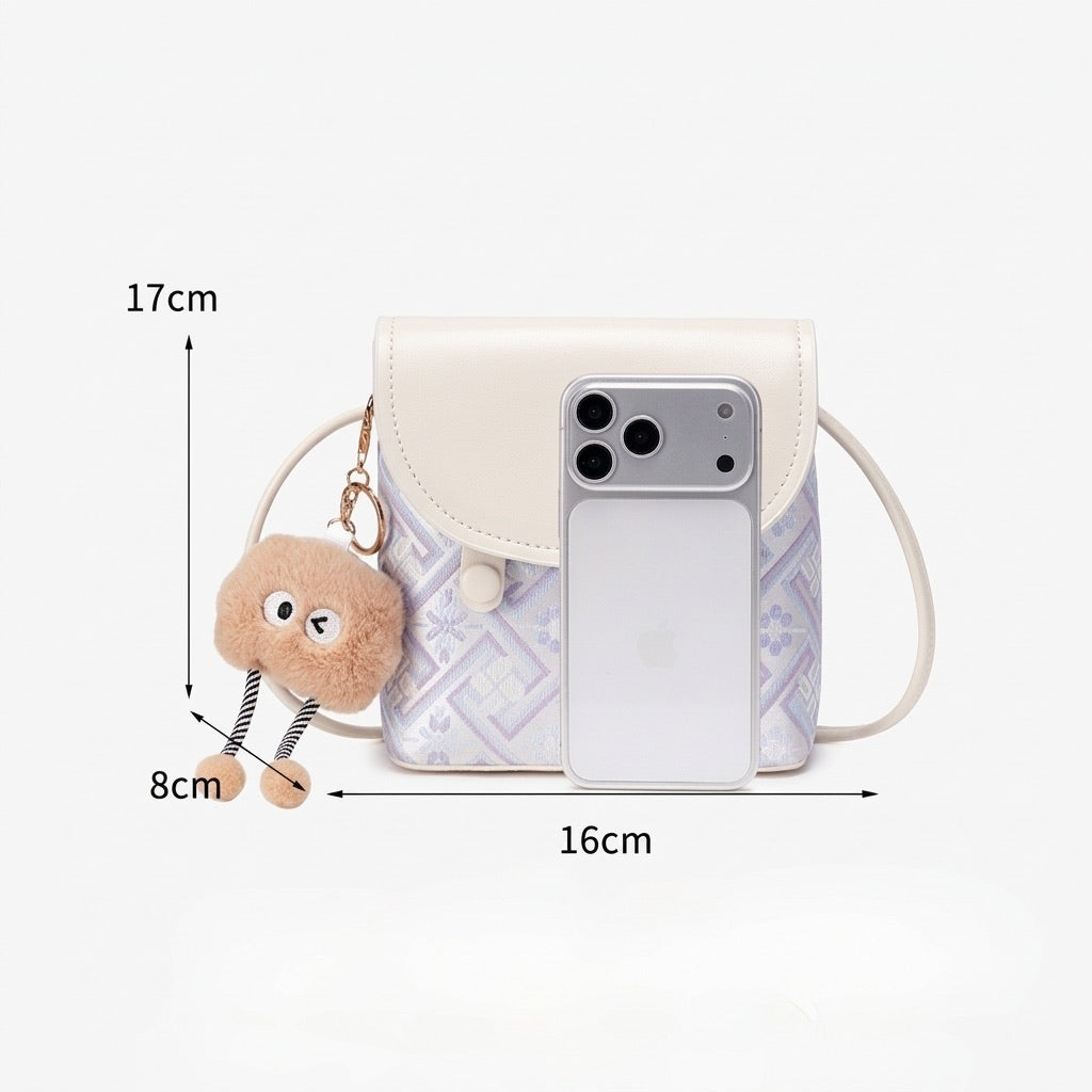 Mini sac bandoulière raffiné en cuir écologique végan avec jolie breloque
