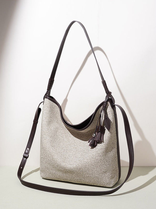 Slouchy Canvas Bucket Clutch Bag with Tassel Charm
