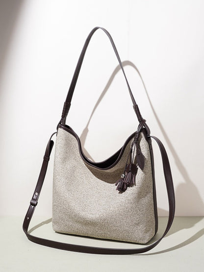 Slouchy Canvas Bucket Clutch Bag with Tassel Charm
