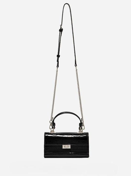 Bolso clutch sobre vintage de cuero genuino con acabado brillante tipo cocodrilo