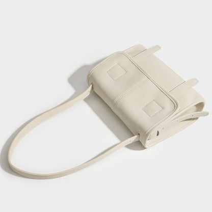 Borsa a spalla e tracolla minimalista in vera pelle testurizzata con patta
