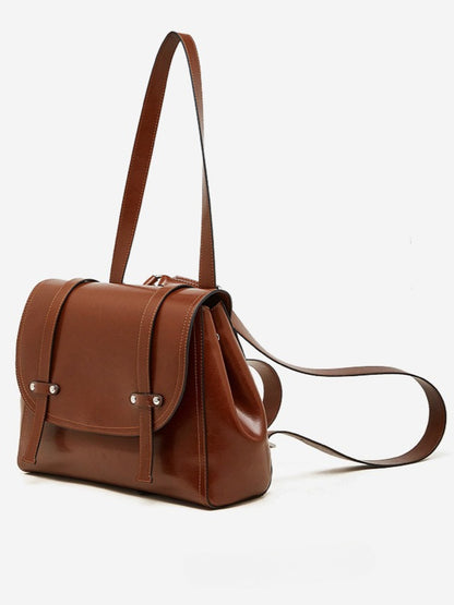 The Oil-Waxed Genuine Leather Convertible Flap Backpack Shoulder Bag