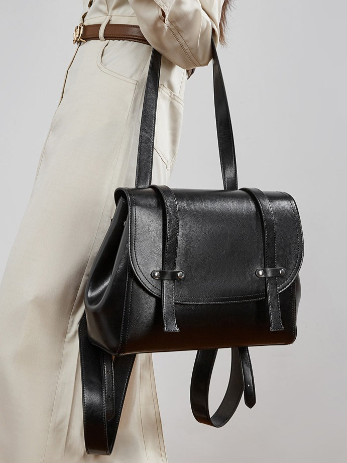 The Oil-Waxed Genuine Leather Convertible Flap Backpack Shoulder Bag