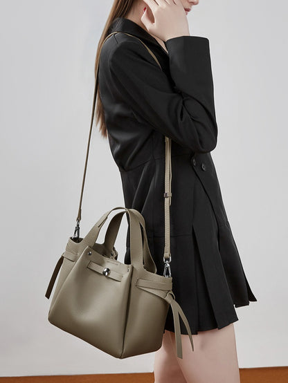 The Pebbled Genuine Leather Mini Bucket Tote Bag with Turn-Lock Closure