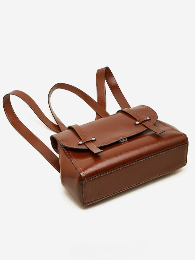 The Oil-Waxed Genuine Leather Convertible Flap Backpack Shoulder Bag