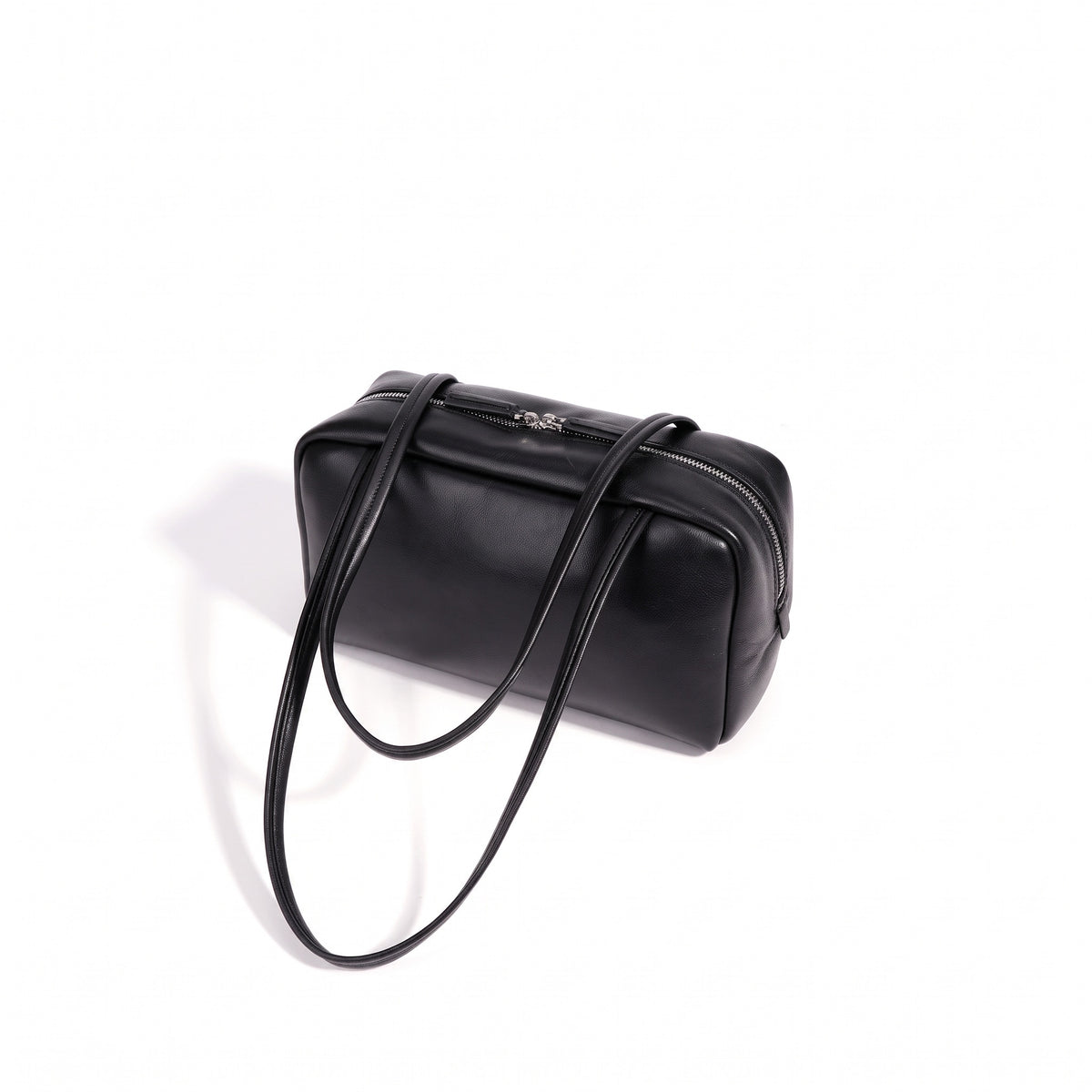 Bolso de mano tipo clutch minimalista de piel de oveja genuina con forma de bolera