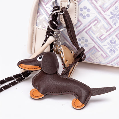 Sac pochette Boston doux en cuir écologique végan avec breloque teckel mignon