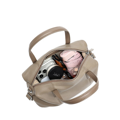 Borsa pochette a cuscino in vera pelle morbida dalla texture martellata