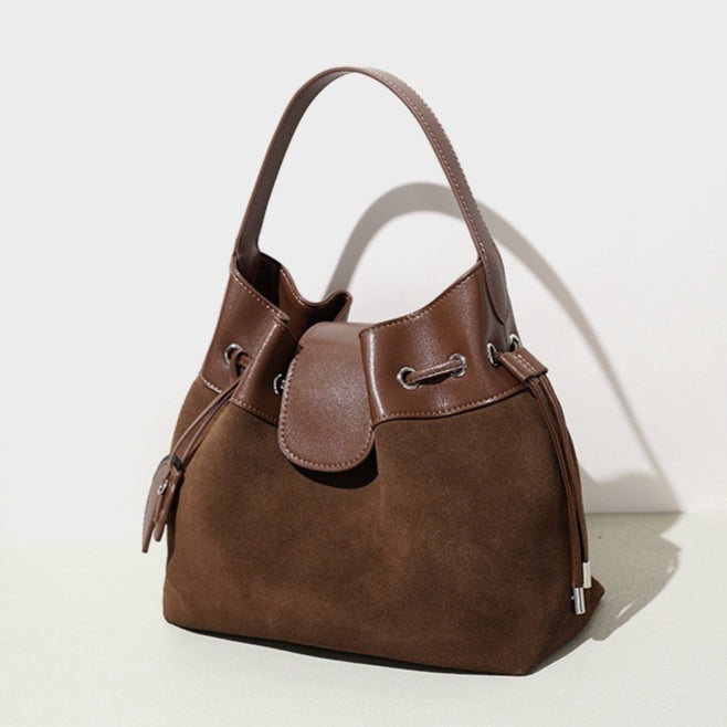 Chic Suede Leather Drawstring Bucket Bag with Horse Charm