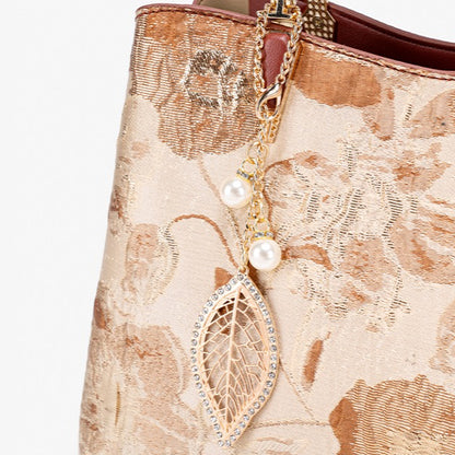 Quiet Luxe Floral Vegan Eco-Leather Clutch Bag with Leaf Charm
