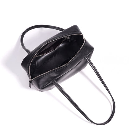 Bolso de mano tipo clutch minimalista de piel de oveja genuina con forma de bolera