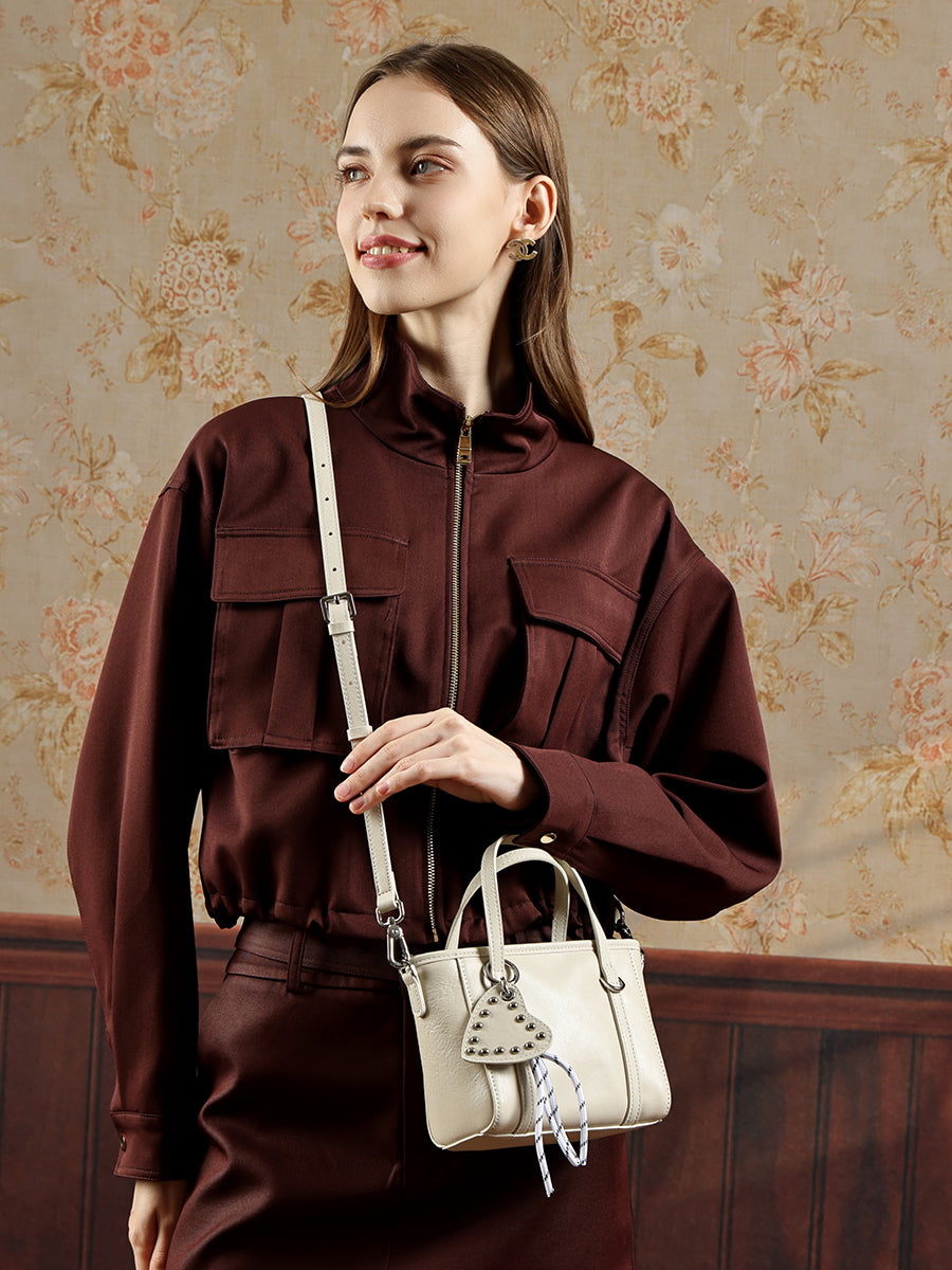 Mini tote a tracolla in vera pelle scolpita con distintivo cuore