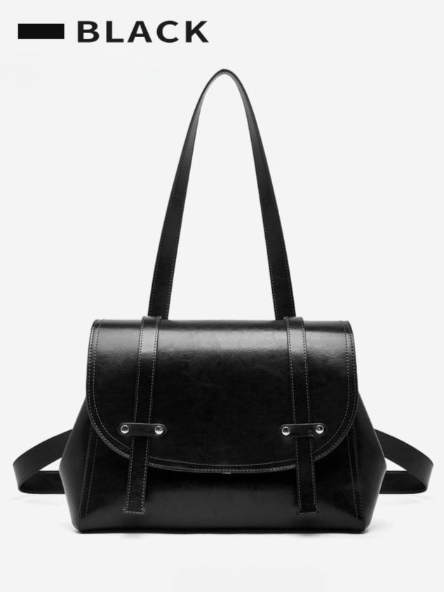 The Oil-Waxed Genuine Leather Convertible Flap Backpack Shoulder Bag