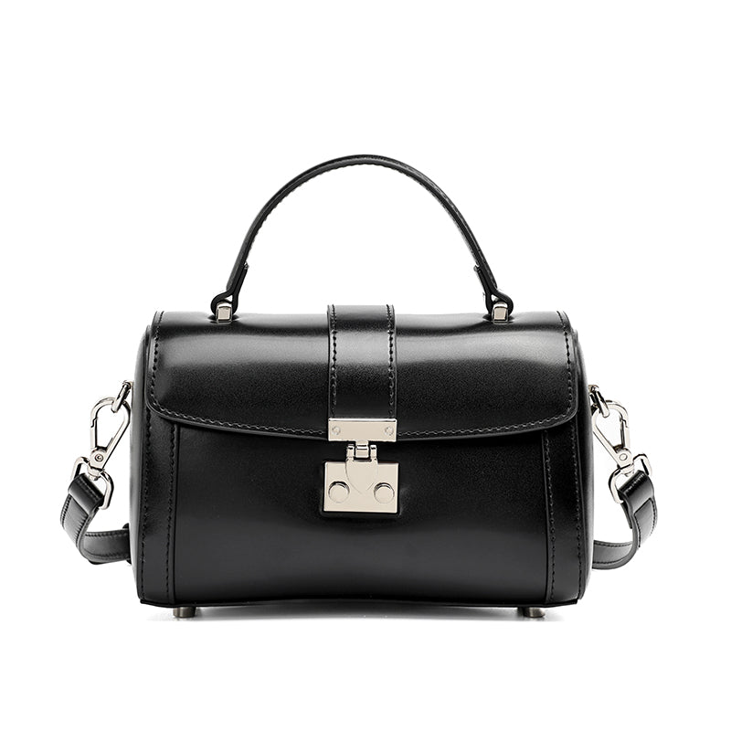 Bolso de mano tipo clutch cilíndrico de cuero genuino con estilo chic  