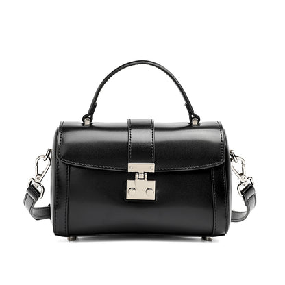 Bolso de mano tipo clutch cilíndrico de cuero genuino con estilo chic  