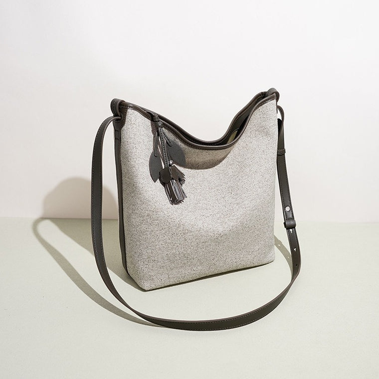 Slouchy Canvas Bucket Clutch Bag with Tassel Charm