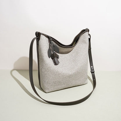 Slouchy Canvas Bucket Clutch Bag with Tassel Charm