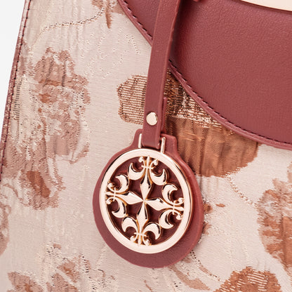 Borsa pochette elegante con fiori, ecopelle vegana e charm rotondo in metallo