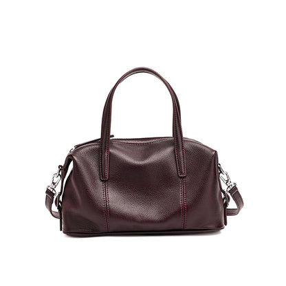 Borsa pochette a cuscino in vera pelle morbida dalla texture martellata