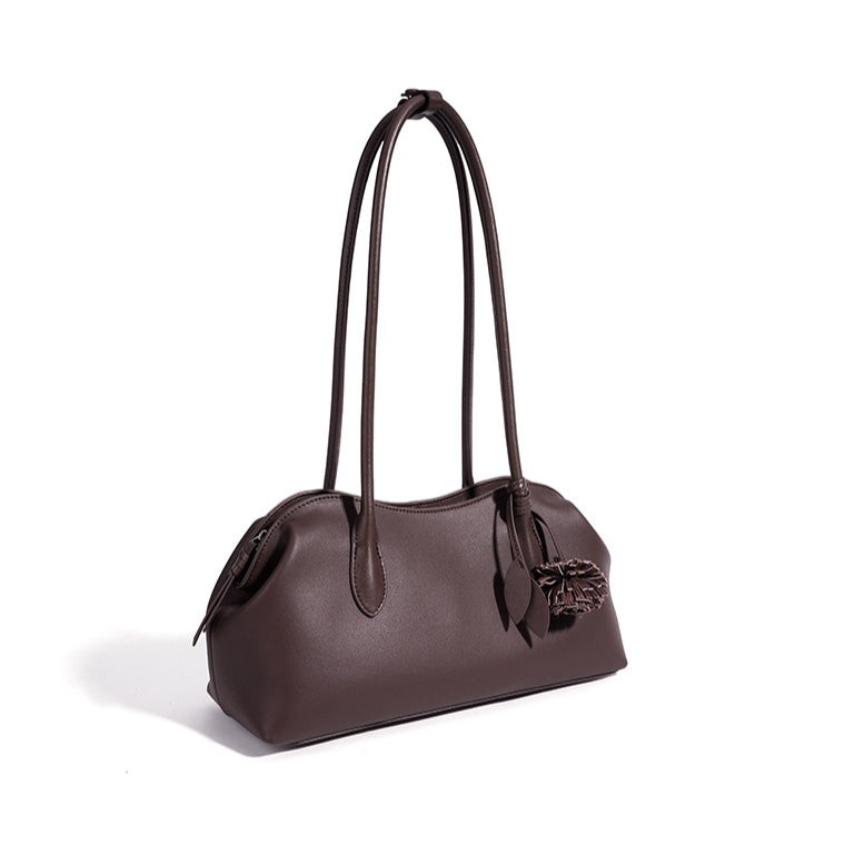 Minimalist Supple Genuine Leather Curved Clutch Bag with Playful Charm