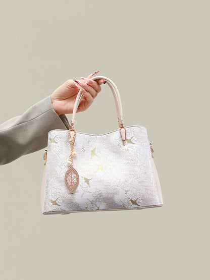 Sophisticated Oriental Jacquard Vegan Eco‑Leather Clutch Bag with Leaf Charm
