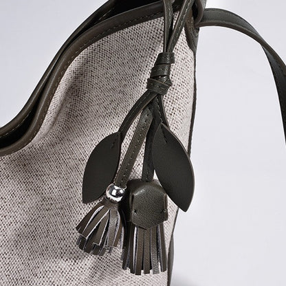 Slouchy Canvas Bucket Clutch Bag with Tassel Charm
