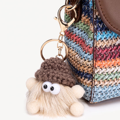 Borsa clutch a patta intrecciata a righe arcobaleno in ecopelle vegana con adorabile charm