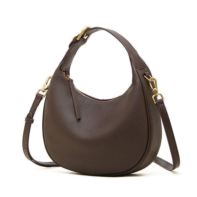 Borsa minimalista a spalla e tracolla a mezzaluna in vera pelle martellata