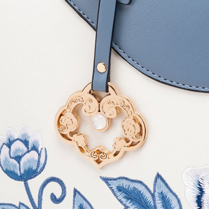 Borsa pochette elegante in ecopelle vegana ricamata a peonie, con charm
