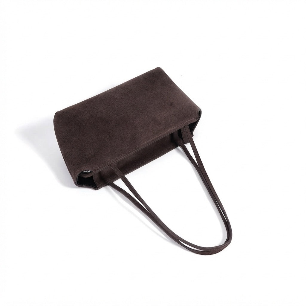 Pochette vintage en cuir suédé