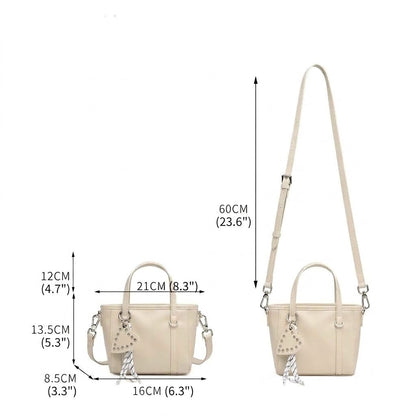 Mini tote a tracolla in vera pelle scolpita con distintivo cuore